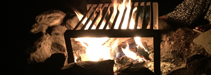 Photo of a campfire at night