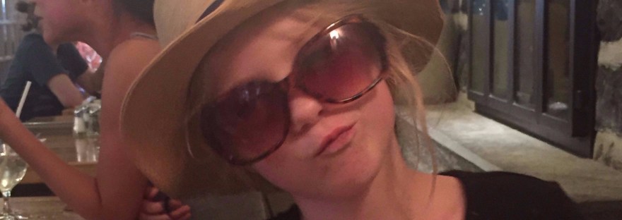 Photograph of girl dressed up like adult